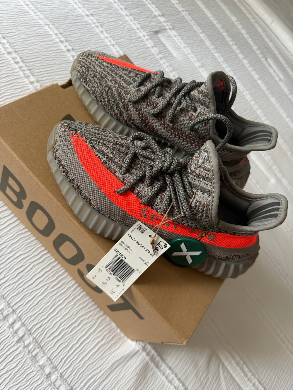 Yeezy Boost Kids Grey Knit Sneakers with Bright Orange Stripe